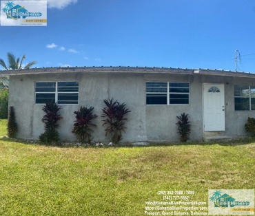 BB-085 BACK-OF-TOWN FREEPORT GRAND BAHAMA-FIVE BEDROOM, TWO BATH ROOMS HOUSE