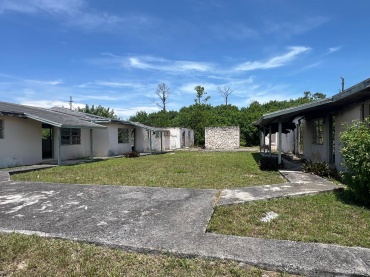 BB-205  6-PLEX FIXER-UPPER-OFF CORAL ROAD AND PONCE DE LEON DRIVE.